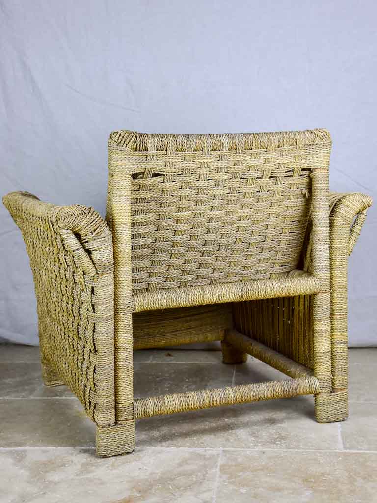 Two vintage rope armchairs and an ottoman