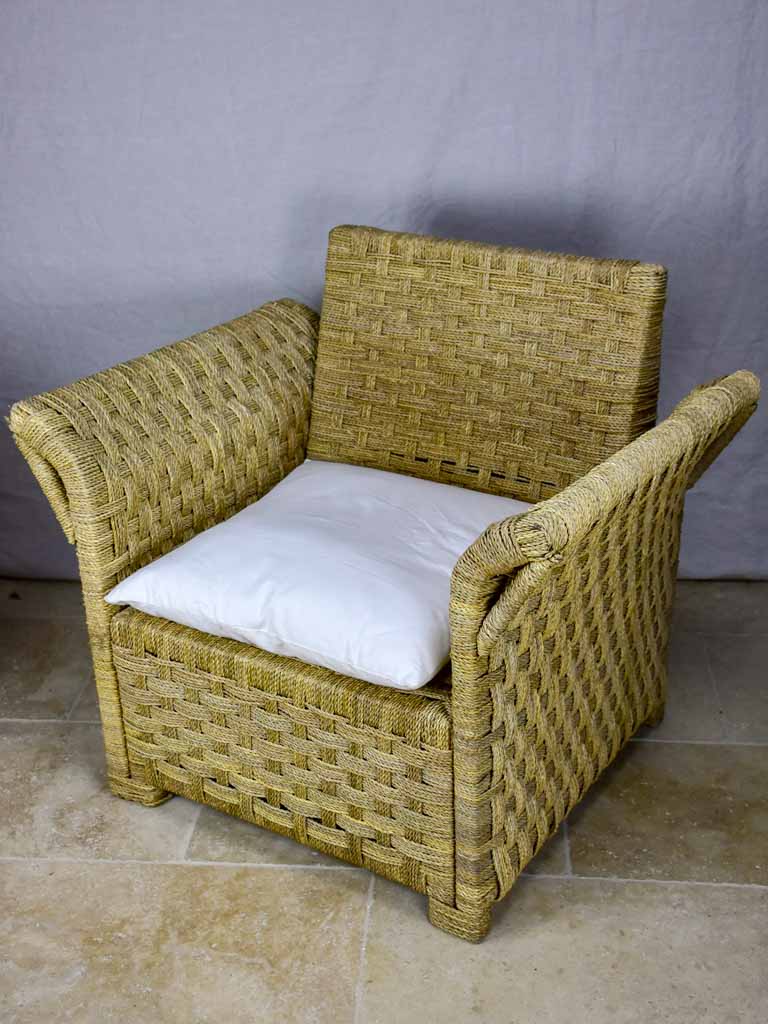 Two vintage rope armchairs and an ottoman