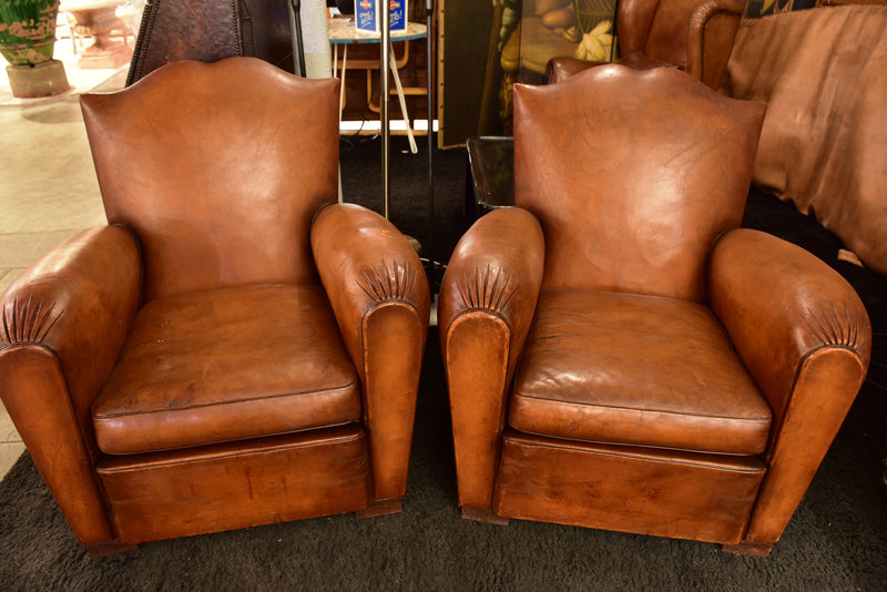 Pair of mustache back vintage French club chairs