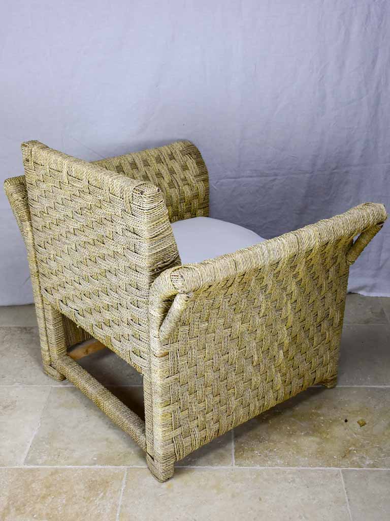 Two vintage rope armchairs and an ottoman