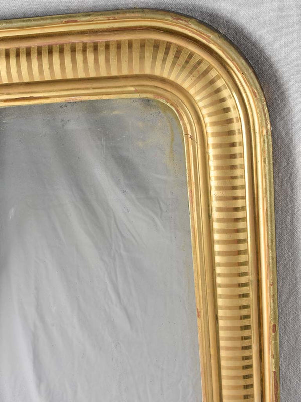 Gold Louis Philippe mirror with striped frame 34¾" x 27¼"