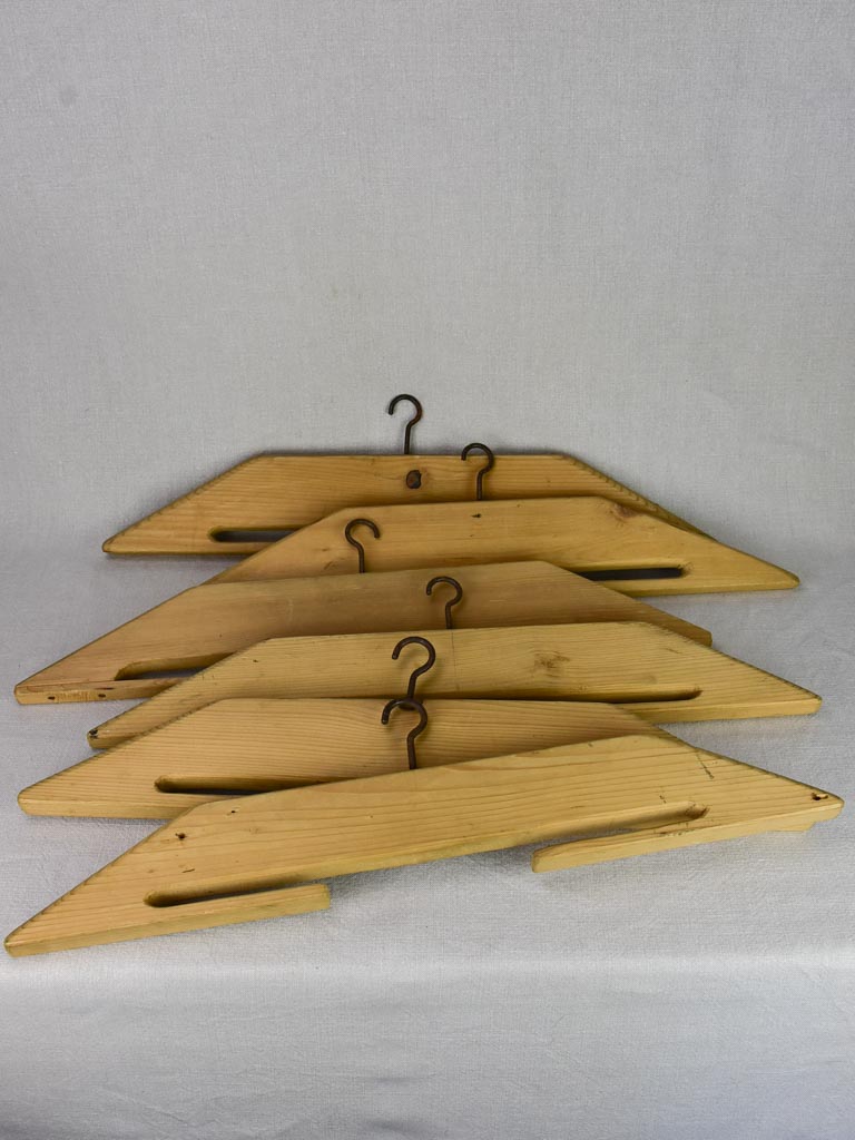 Collection of 6 Monk's coat hangers from the early 20th century