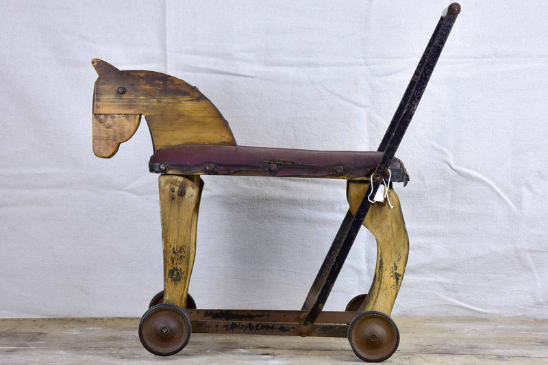 Folk art French toy horse on wheels