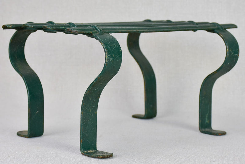 Pair of cast iron foot rests from the 19th century with green patina 8¾" x 11¾"