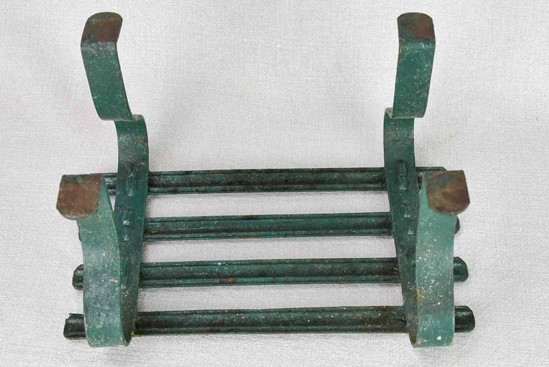 Pair of cast iron foot rests from the 19th century with green patina 8¾" x 11¾"