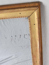Gilded Louis XVI mirror with running pearl and mercury glass 28" x 20¾"