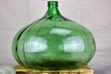 Vintage French demijohn with green glass