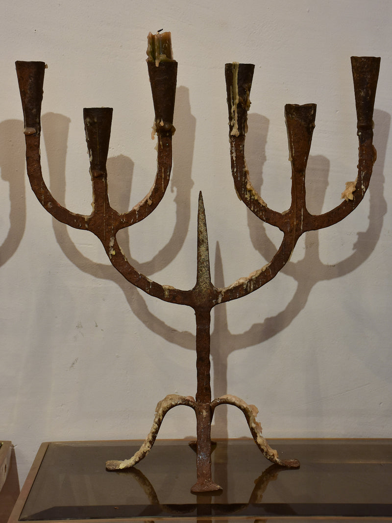 Pair of antique wrought iron candelabras