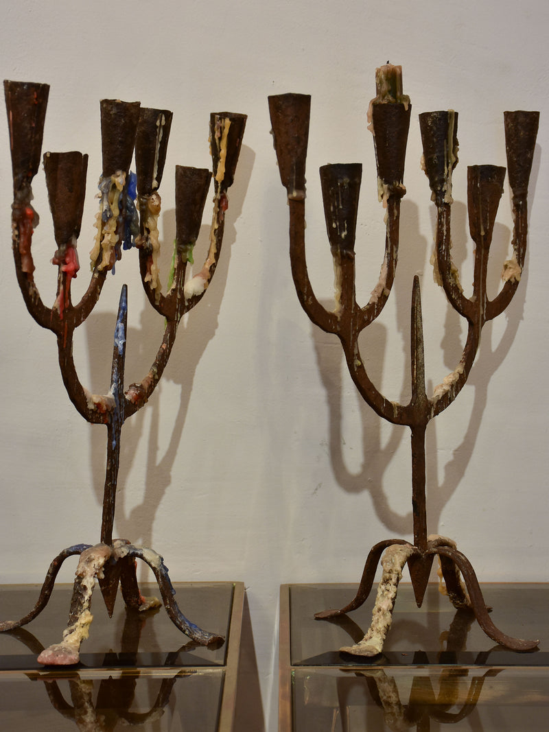 Pair of antique wrought iron candelabras