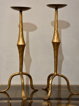 Pair of vintage gold candlesticks with a tripod stand