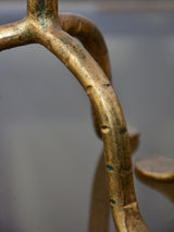 Pair of vintage gold candlesticks with a tripod stand