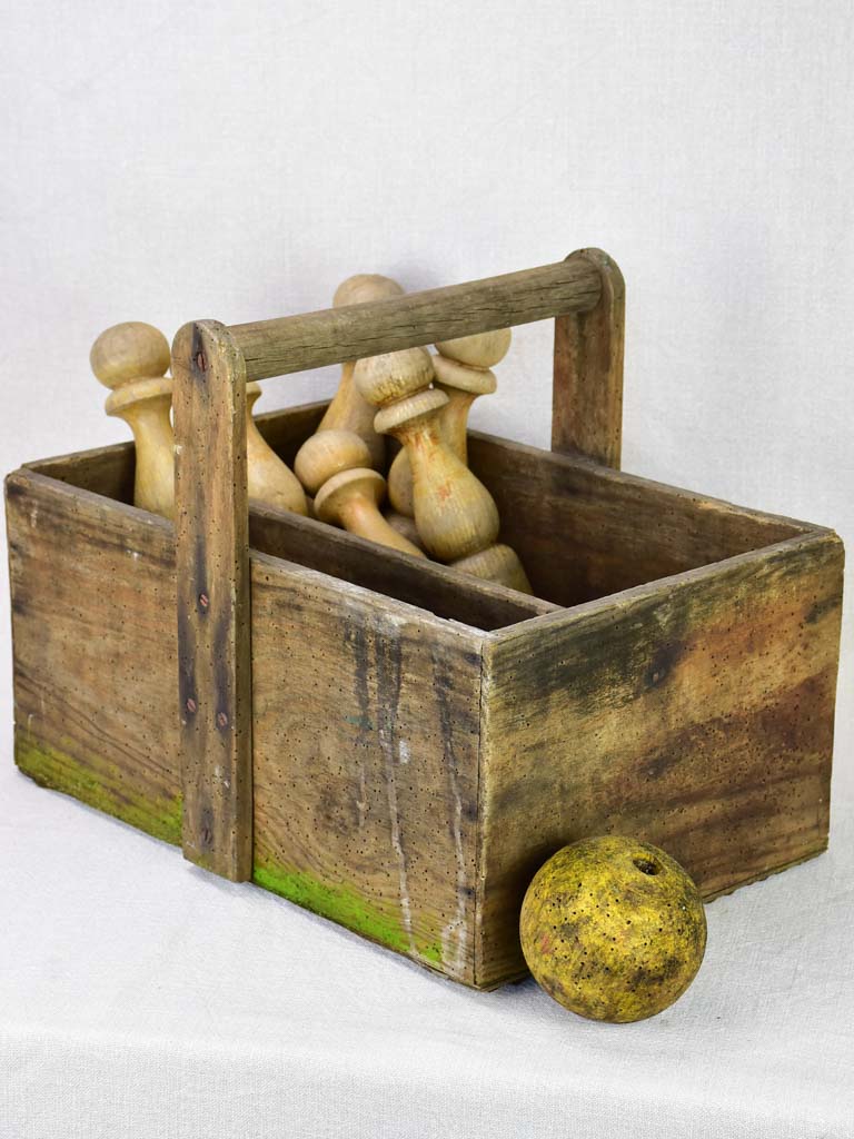 Skittles game and ball in an antique French toolbox