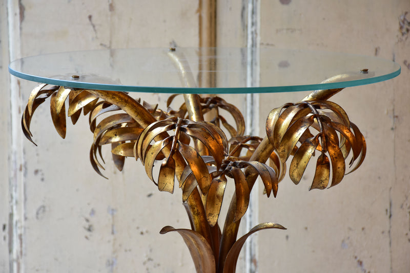 Small round Hans Kögl table with gold palm frond stand
