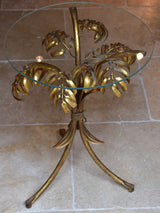 Small round Hans Kögl table with gold palm frond stand