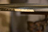 Large round table with cast iron legs and slate table top