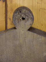 Antique French cutting board in the shape of a coat hanger