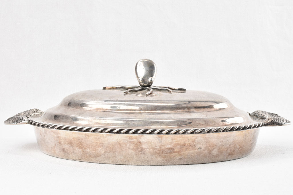 Two silver plate seafood presentation platters