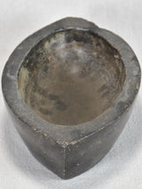 Pointed vintage dark stone mortar