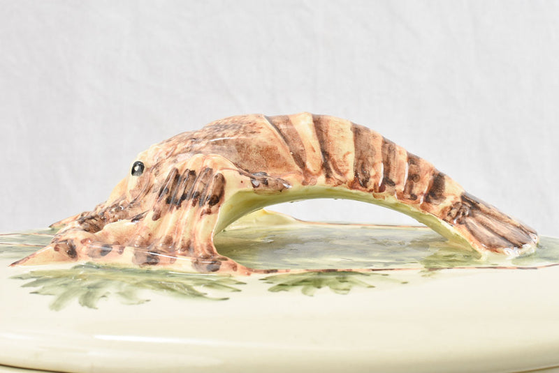 Large oval bouillabaisse tureen with lobster handle