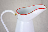 Mid century enamel pitcher - white with red rim 15"