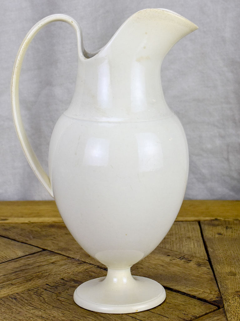 Tall antique French ironstone pitcher