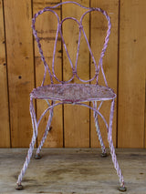 Charming antique French garden chair with pink patina