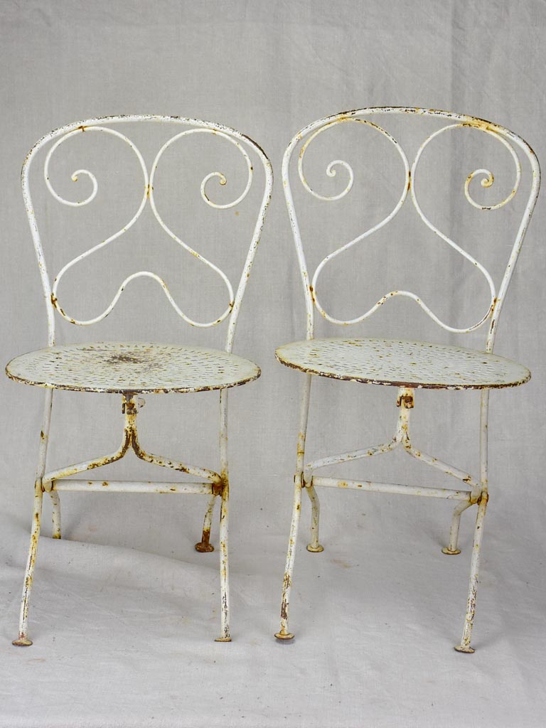 Pair of early 20th Century French children's folding garden chairs - white