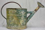 Antique French watering can with green patina