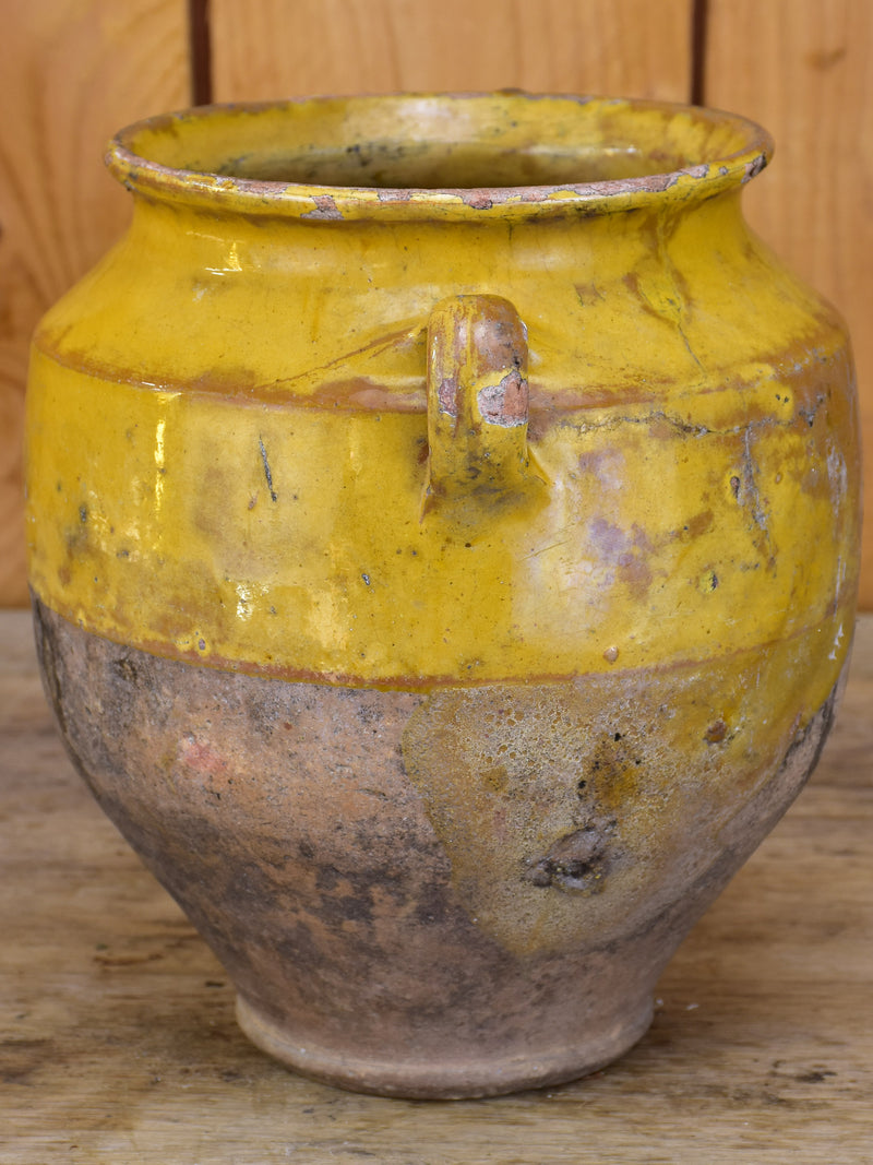 Antique French confit pot with orange glaze