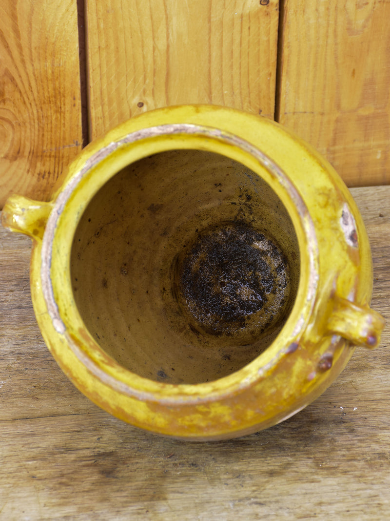 Antique French confit pot with orange glaze