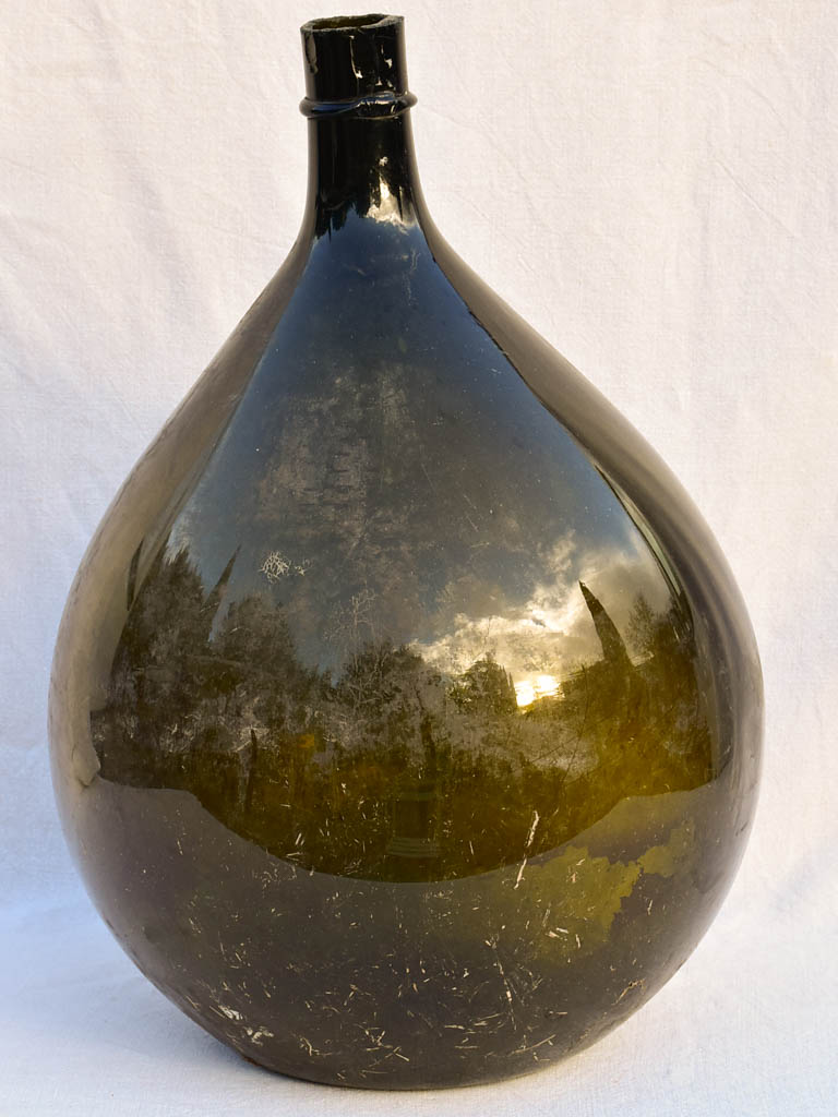 Very large early 20th Century Italian demijohn bottle - dark green / black 27½"