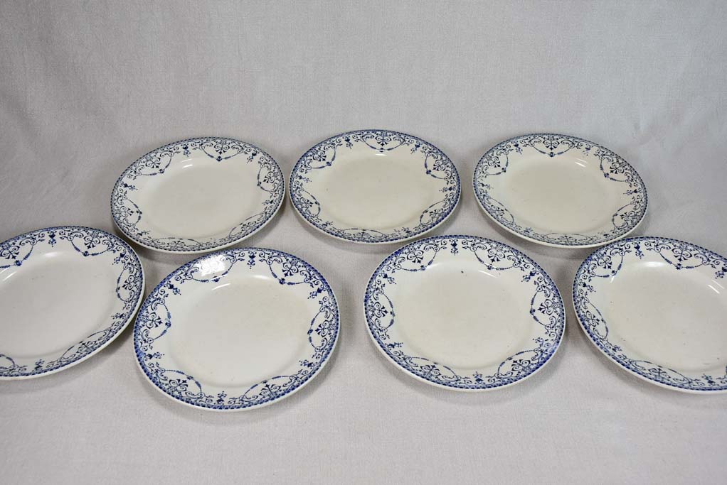 Set of 7 antique French faïence ironstone dinner plates 9"