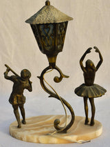 Antique bronze musician boy sculpture lamp