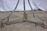 Antique French bistro table with timeworn beige patina