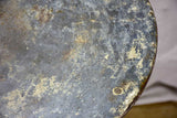 Antique French bistro table with timeworn beige patina