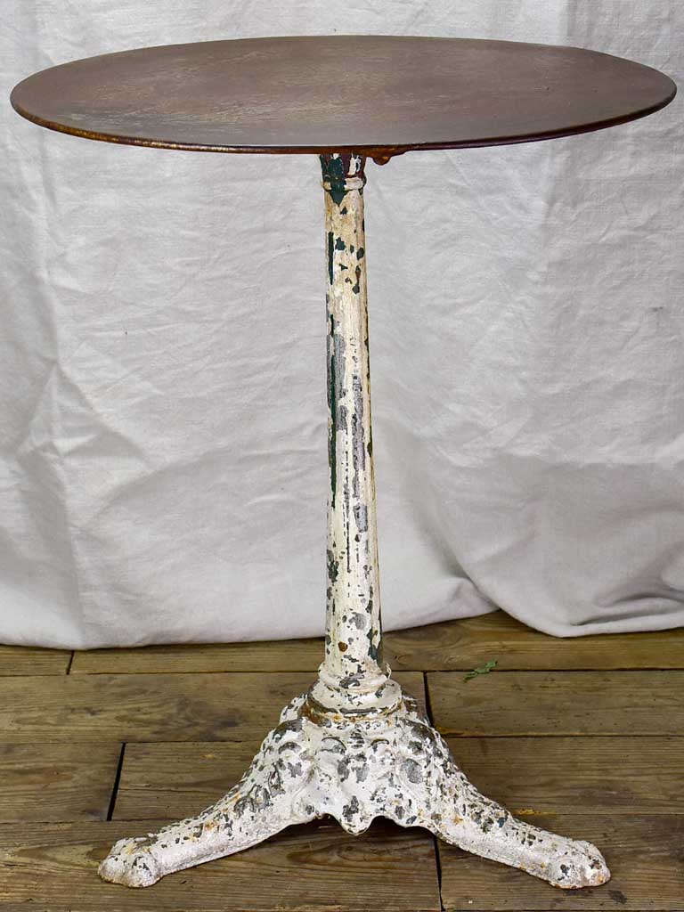 19th Century French bistro table with white cast iron base