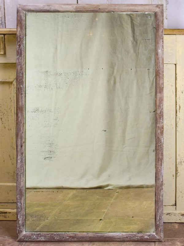 Antique rustic French mirror with simple timber frame 2/2. 26¾" x 43¼"