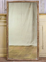 Two rustic antique French mirrors with timber frames