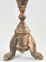 Antique candlestick with characteristic patina