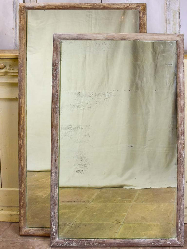 Two rustic antique French mirrors with timber frames