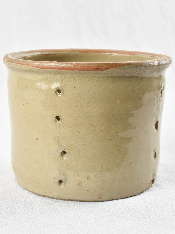 Antique French glazed earthenware cheese strainer