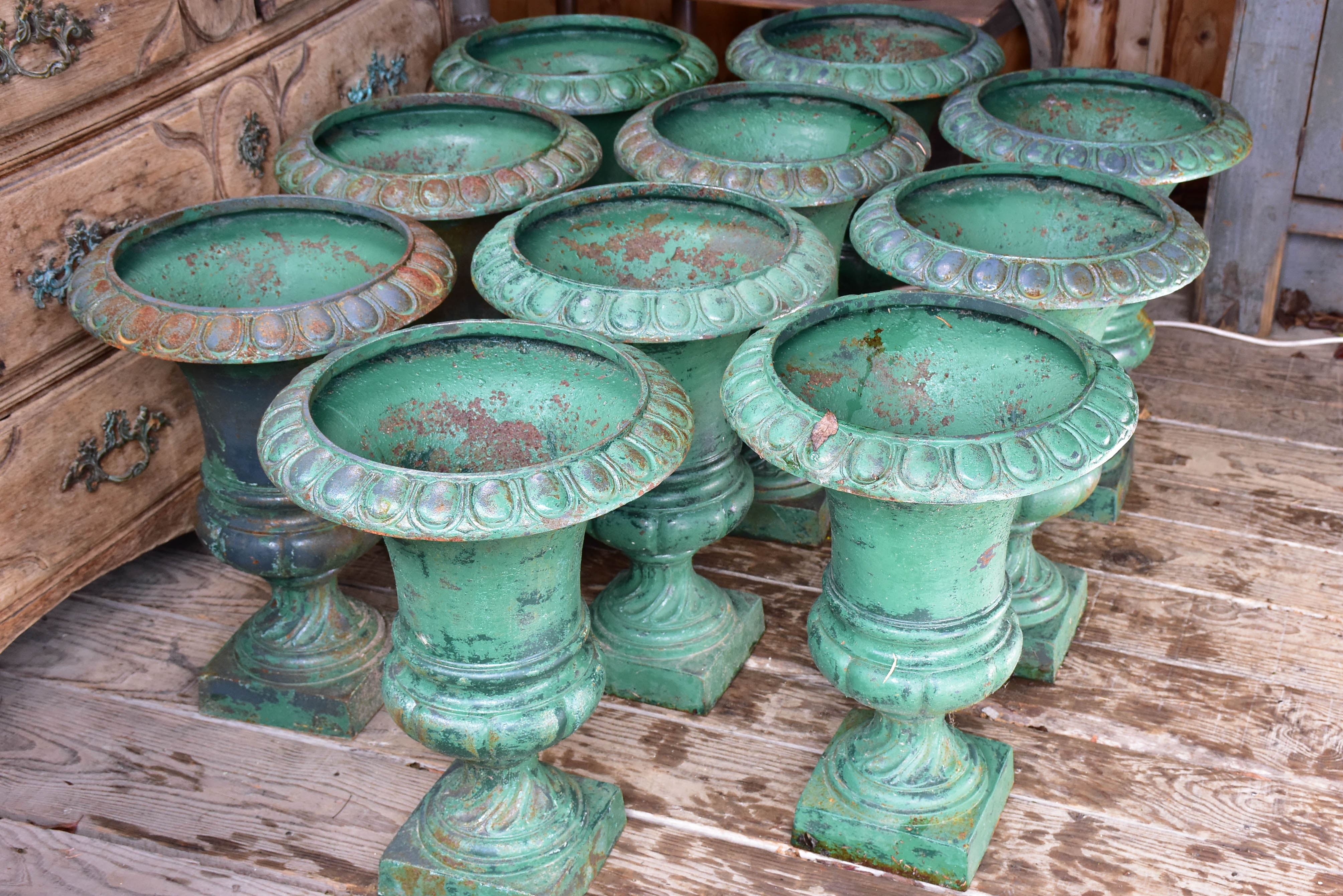 Rare collection of 4 Medici urns with green patina