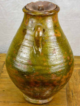 Antique terracotta pot with lid and green glaze