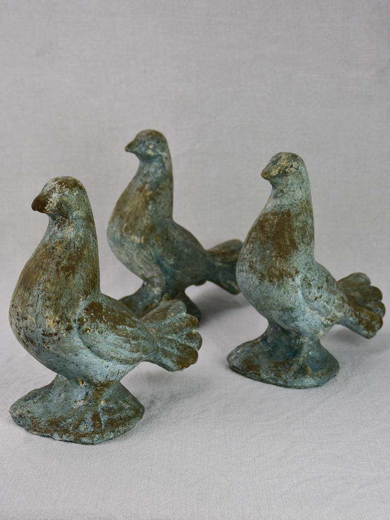 Three vintage French dove sculptures with blue patina