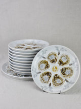 Collection of 10 French oyster plates and platter - hand painted