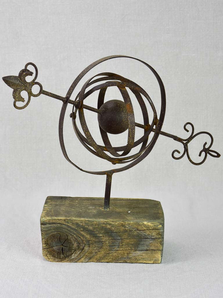 Rustic Armillary sphere mounted on a wooden block