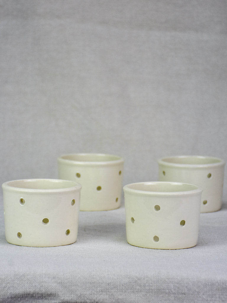 Collection of four white cheese molds #1