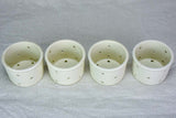 Collection of four white cheese molds #1