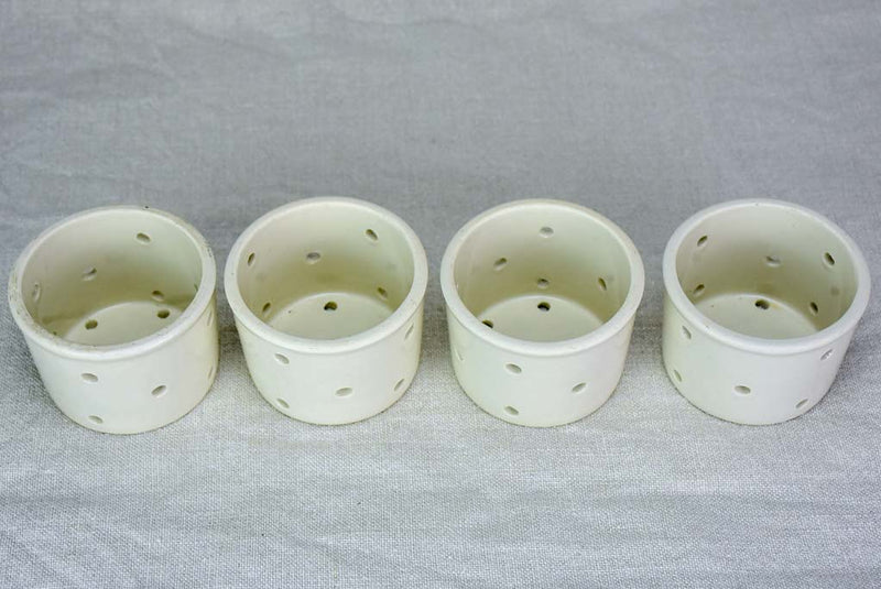 Collection of four white cheese molds #1