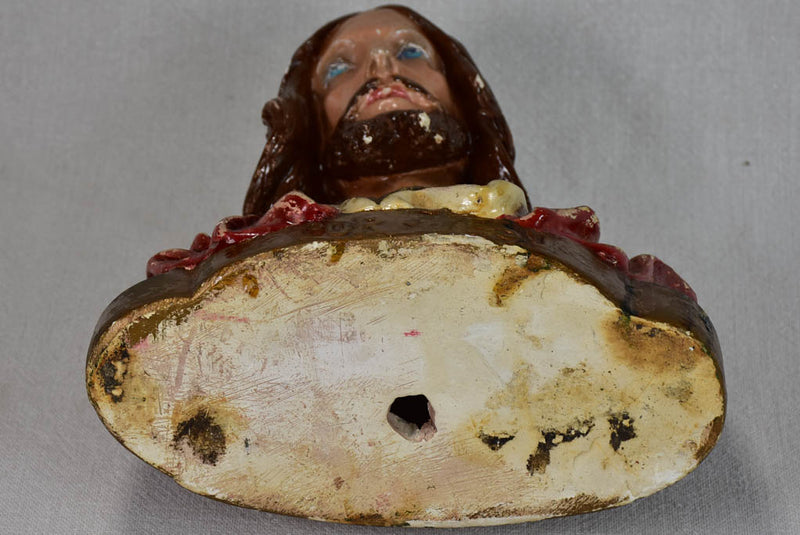 Aged hand-painted plaster sculpture Jesus